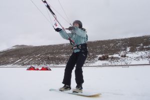 Snowkiting with a snowboard