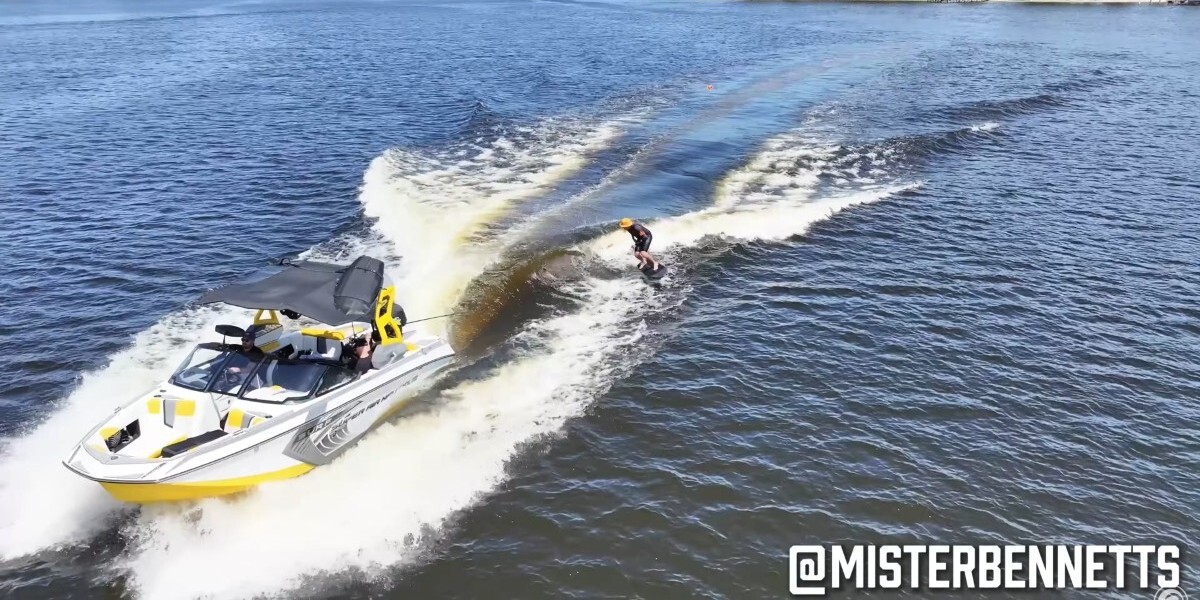 Adam Bennetts improving his foiling skills behind a wake boat