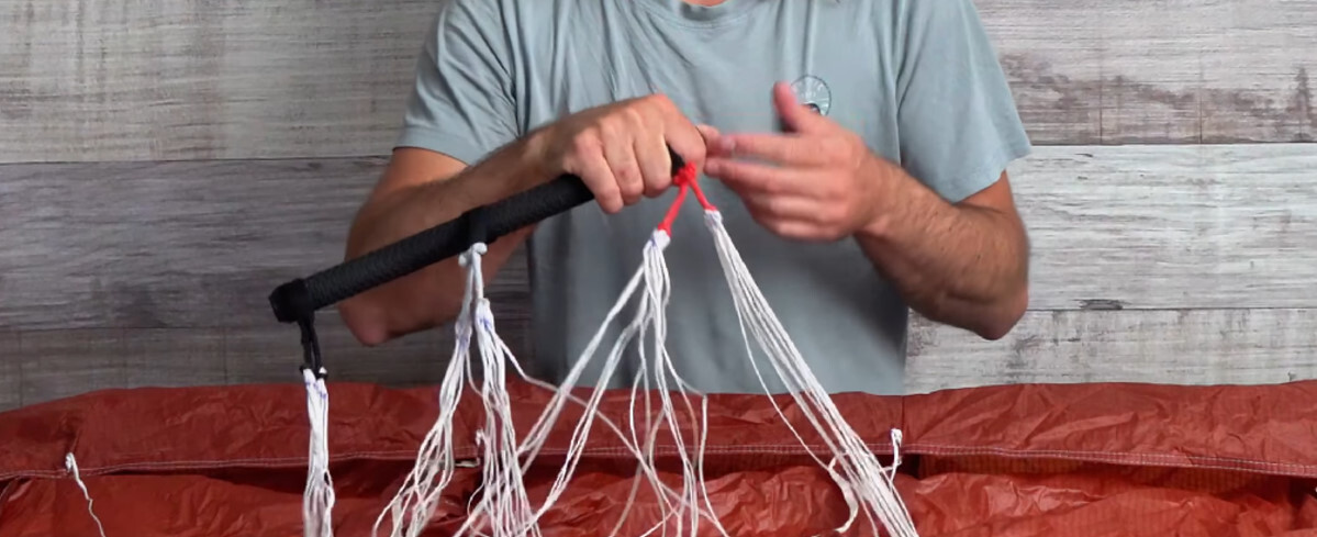 The extended top end of the bar really lets you get a grip. Tucker demonstrating how to hold the bar for the Aeryn P1 parawing