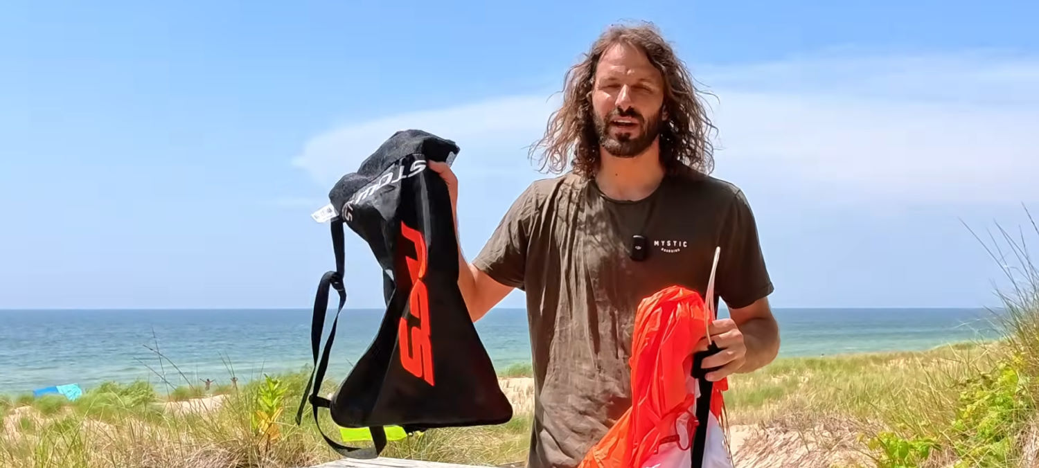The Stow includes a basic but functional bag. Tucker holds up the Stow's bag.