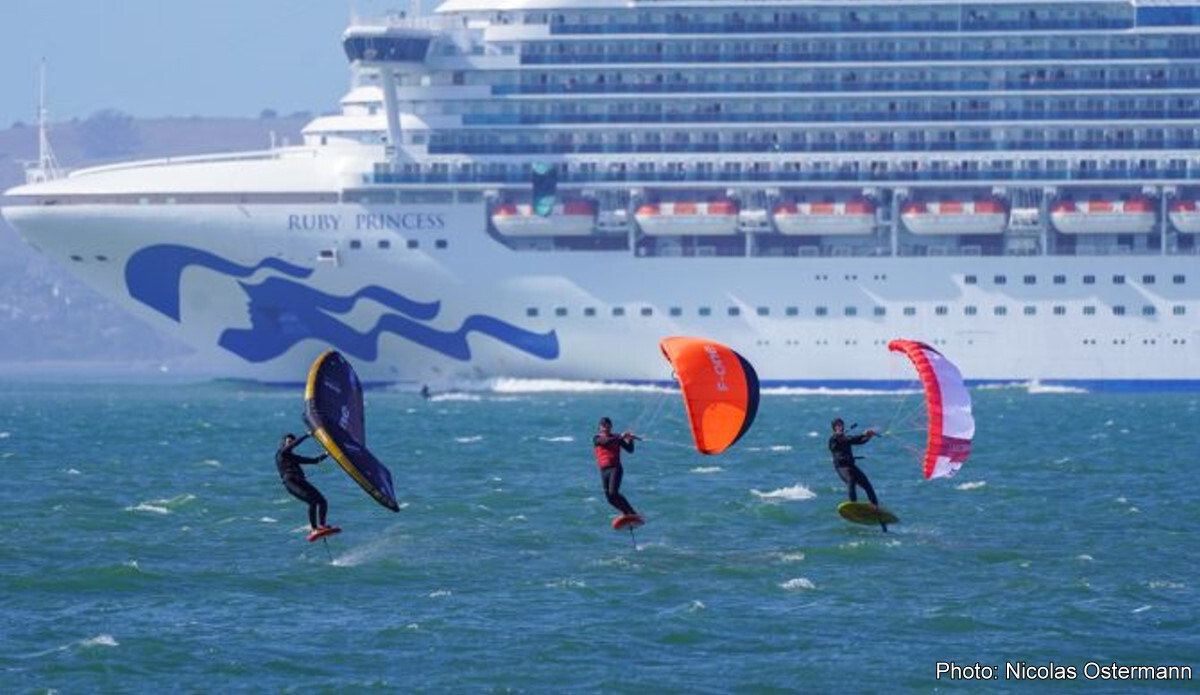 hydrofoil riders with a wing, K-Wing, and parawing