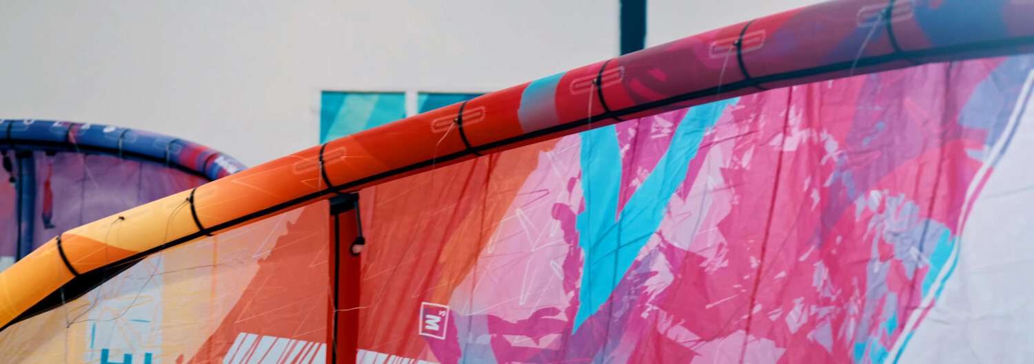 Brainchild is working hard to strengthen the closing seam on the leading edge. The closing seam runs the length of the leading edge on a kite.