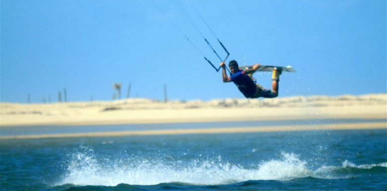 The life of kiting in brazil: sand, water, and sun.