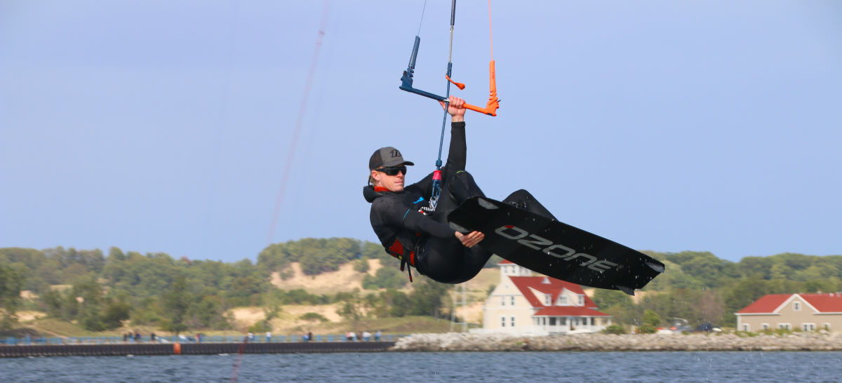Be kind to your joints and you'll have better, longer sessions. Jeff jumps while controlling the kite with one hand.