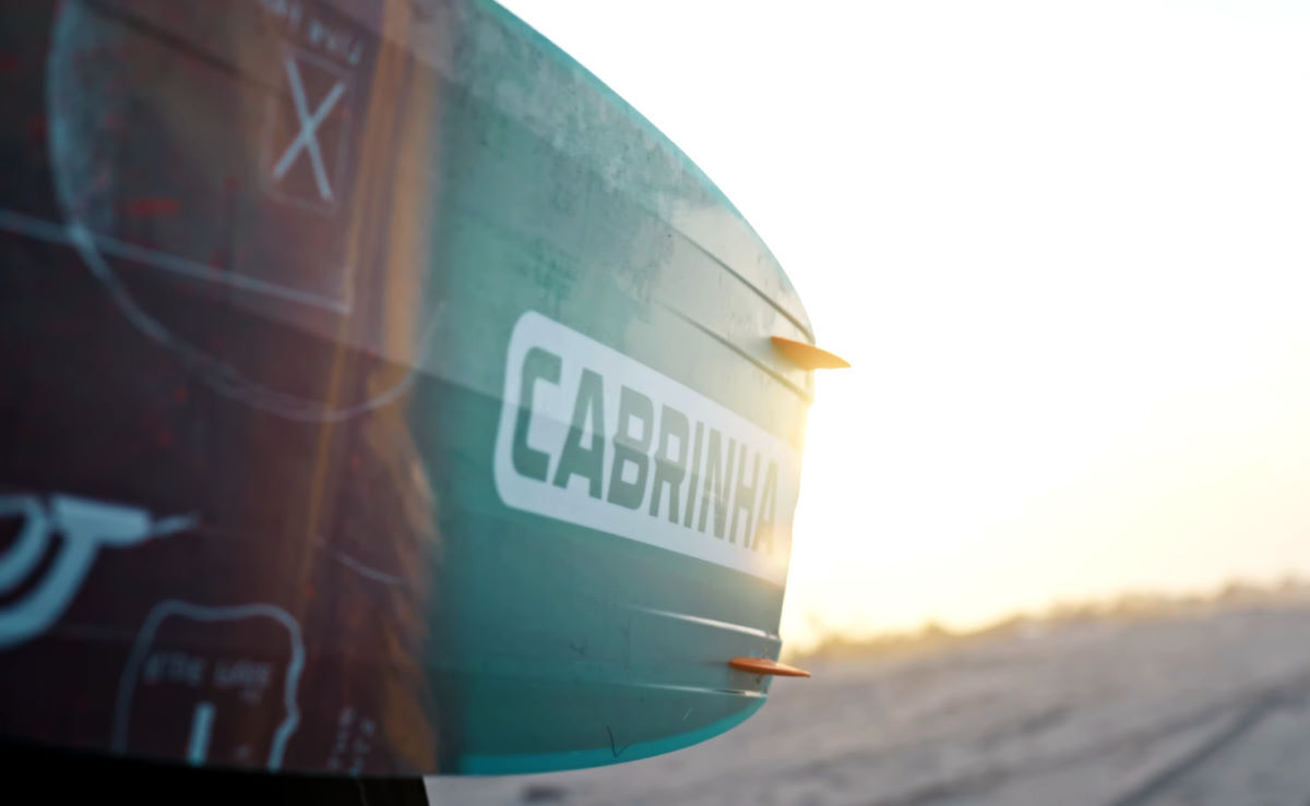 The sun refelcts off the bottom of the board, showing its channels.