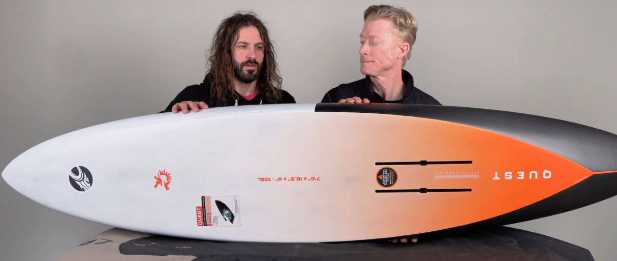 Tucker and Jeff examine the bottom of the Quest.