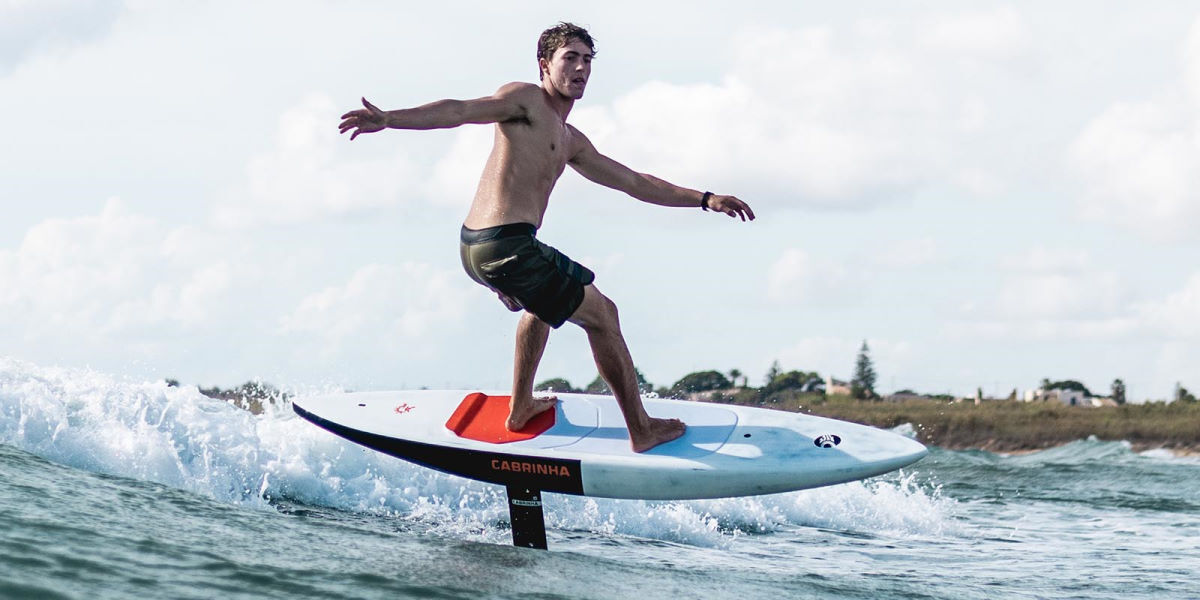 A rider surfs a wave on the Cabrinha Quest.