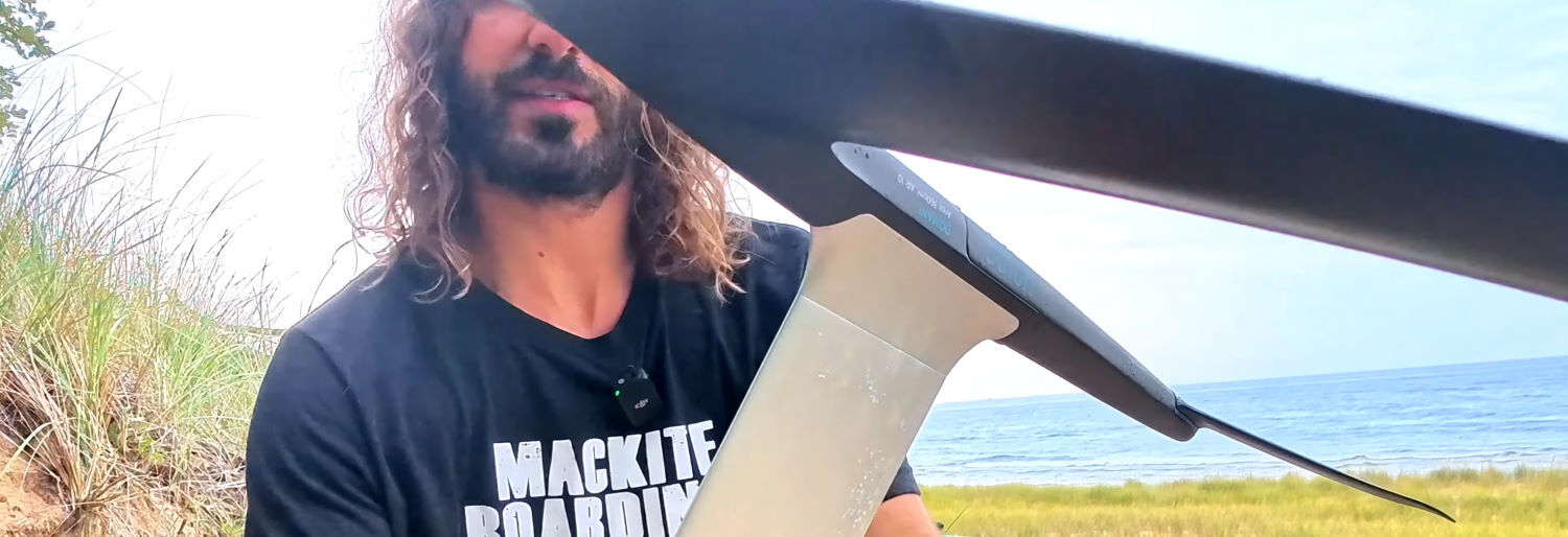 The connection is tight, with close tolerances that give it a solid, locked-in feel. Close-up of the mast foot connection to the fuselage.
