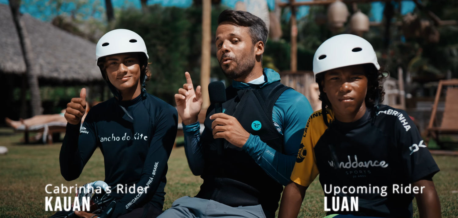 Cabrinha riders Kauan and Luan sit beside Rubens as he interviews them.