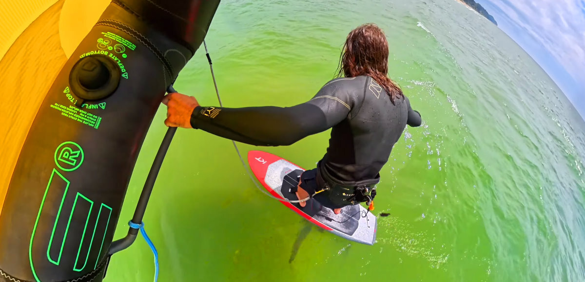 Tucker hold his wing out to one side while riding.