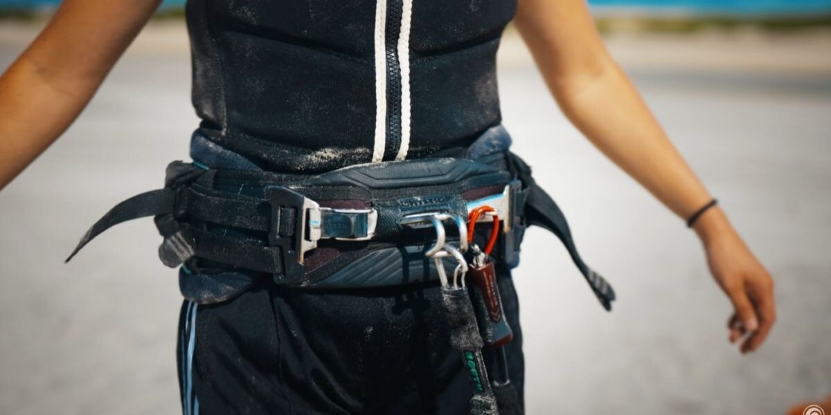 Closeup of harness and impact vest configuration