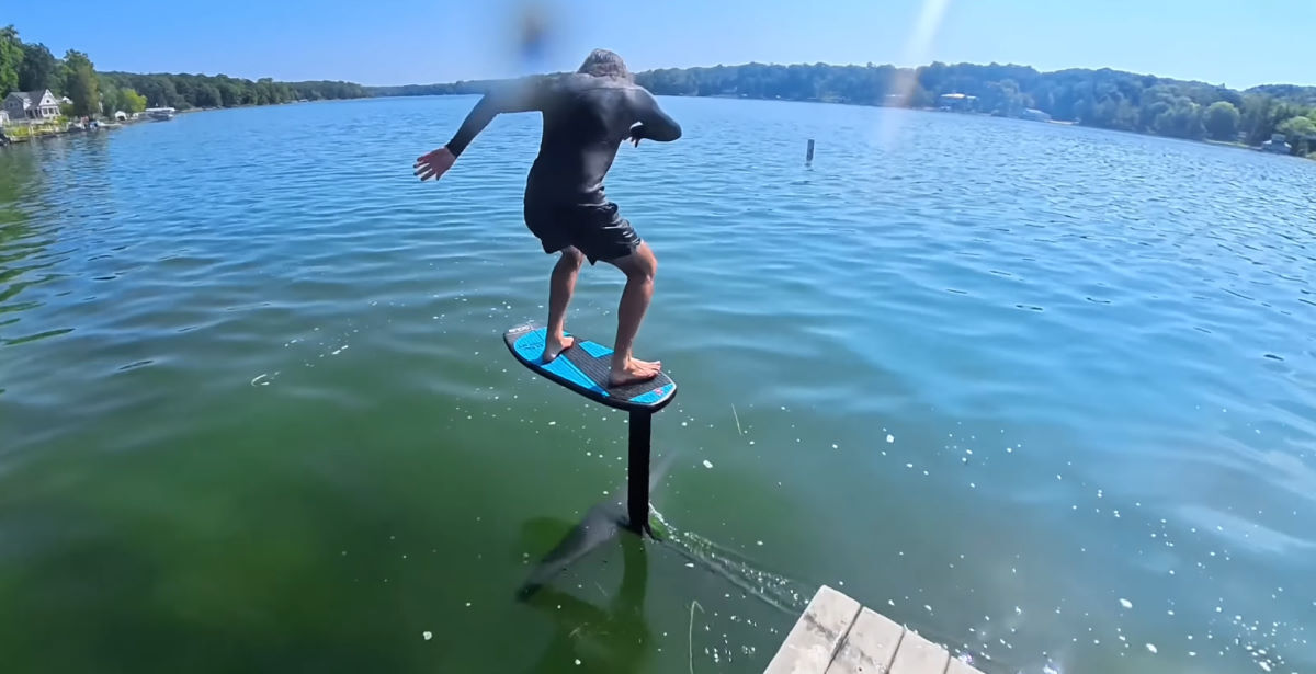 Tucker rides the foil after launching from a dock.