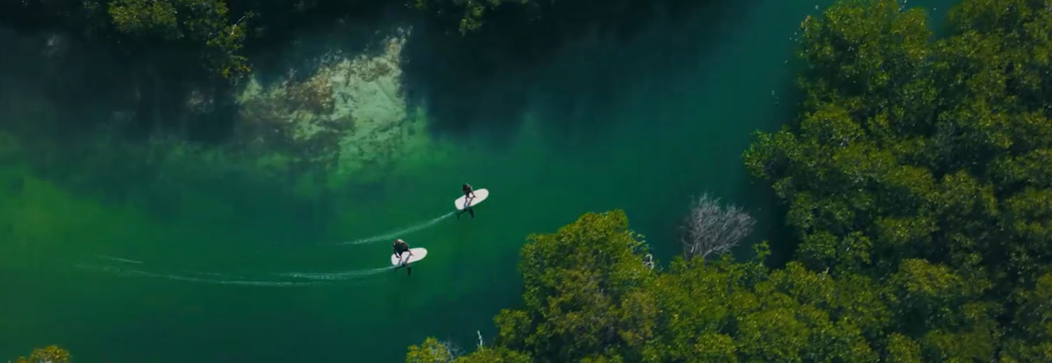 Explore new places on your Fliteboard. Two riders cruise on Fliteboard eFoils.
