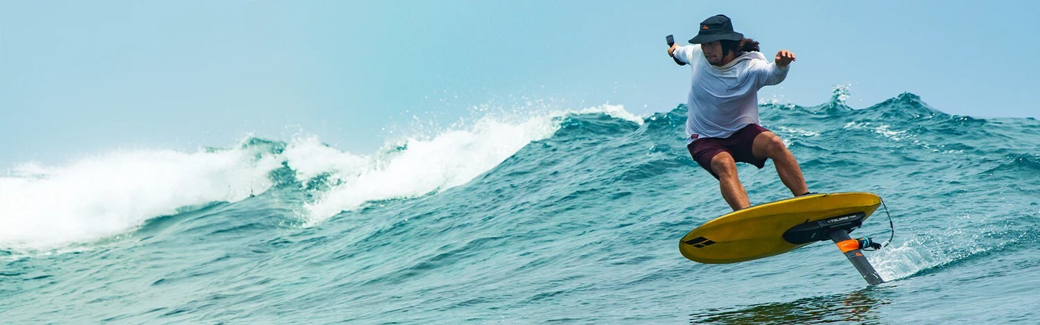 Foil Drive and their motorized foil systems in the surf