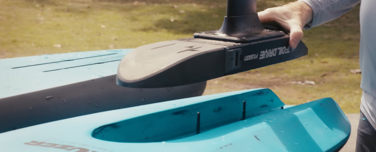 The Fusion is lowered into place on a foilboard with a trench.