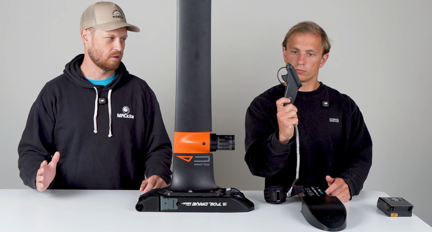 The V3 remote has some cool new features. Hunter holds up the remote.