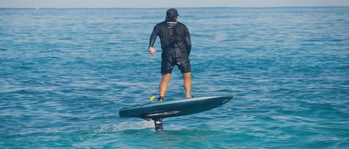 A foilboarder rides with the Foil Drive Fusion.