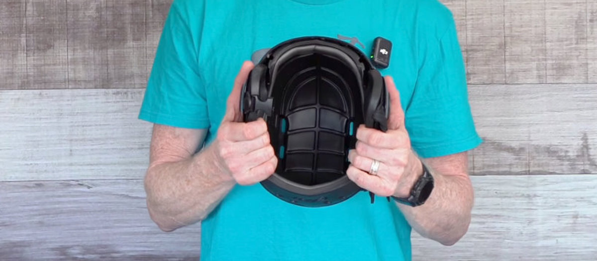 Jeff shows the padding inside the helmet.