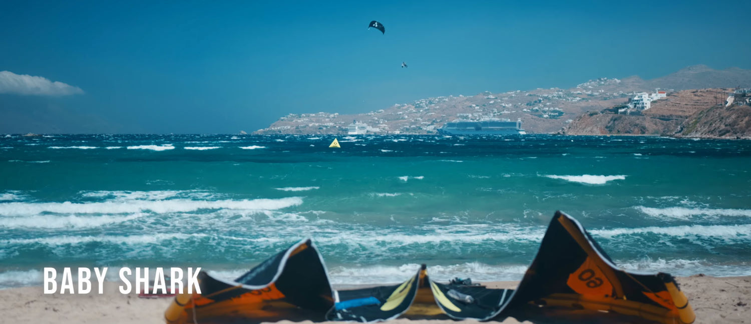 Baby Shark went huge, landing a massive trick in a well-timed gust. Baby Shark catches a massive gust and goes big.