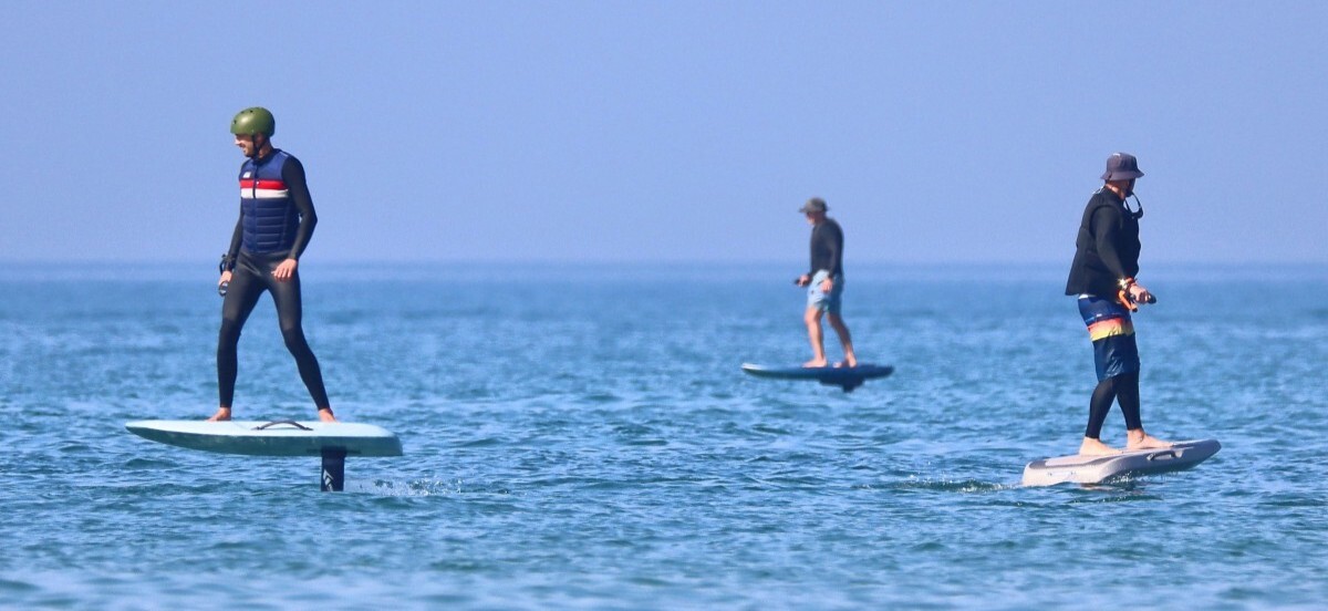 Group riding Waydoo efoils in Lake Michigan