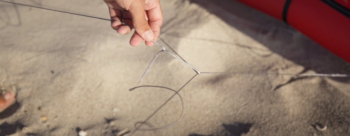 The bridles need to be sorted as well. A kiteboarder shows a tangled bridle.