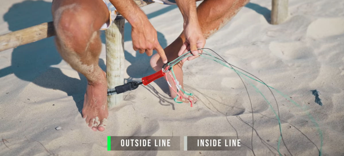 Your kite leash doubles as a handy way to attach the lines to the post. Rubens attaches the lines to the post using his safety leash.