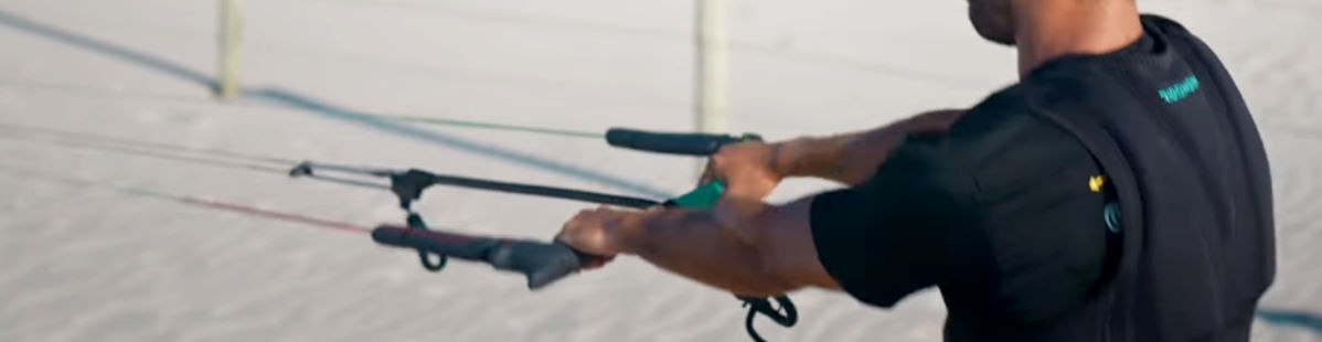 A few good tugs and you're done! Rubens pulls hard on the bar to stretch the lines out just a bit more.