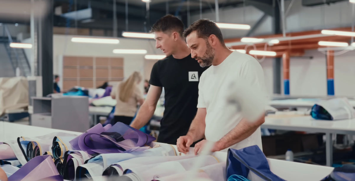 Sticking with Ralf was a tough but good decision. Aaron works on a kite design beside Ralf Groesel.