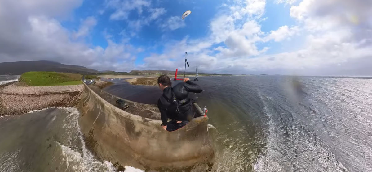 Stig jumps over a tall jetty.