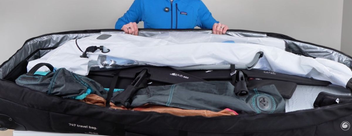 Jeff displaying how he packs his wing foil board bag