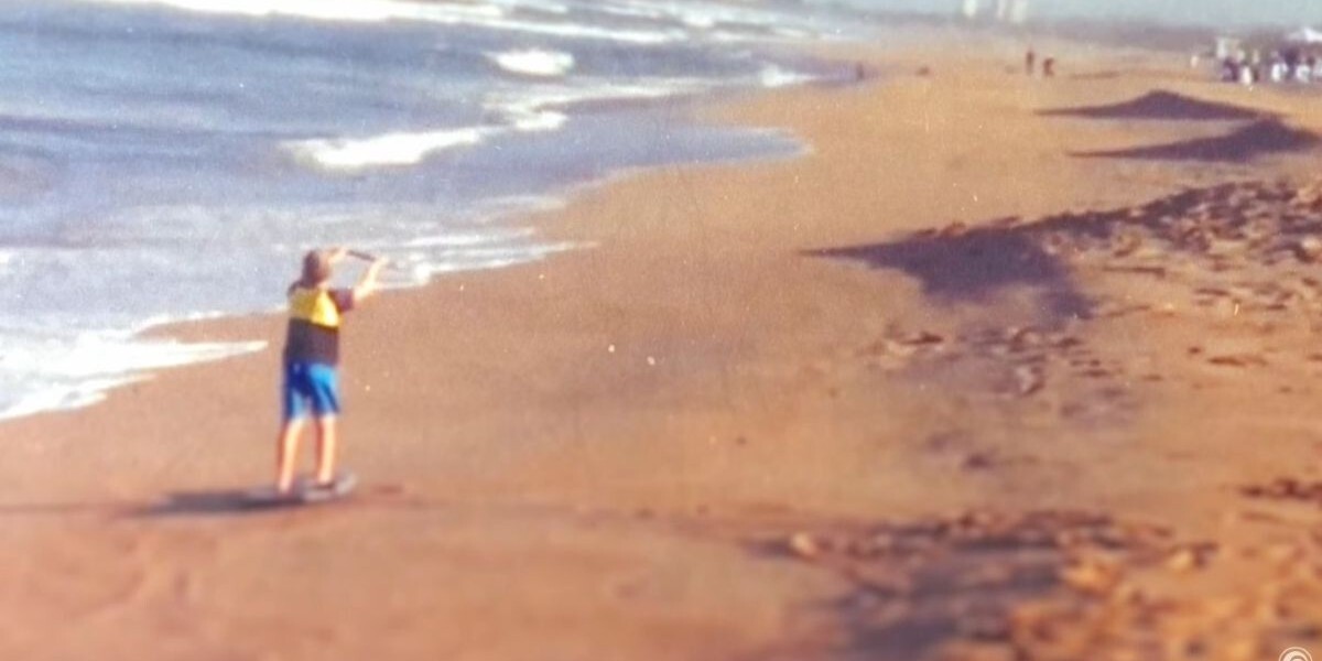 Josh Gillitt learning how to kiteboard at a young age