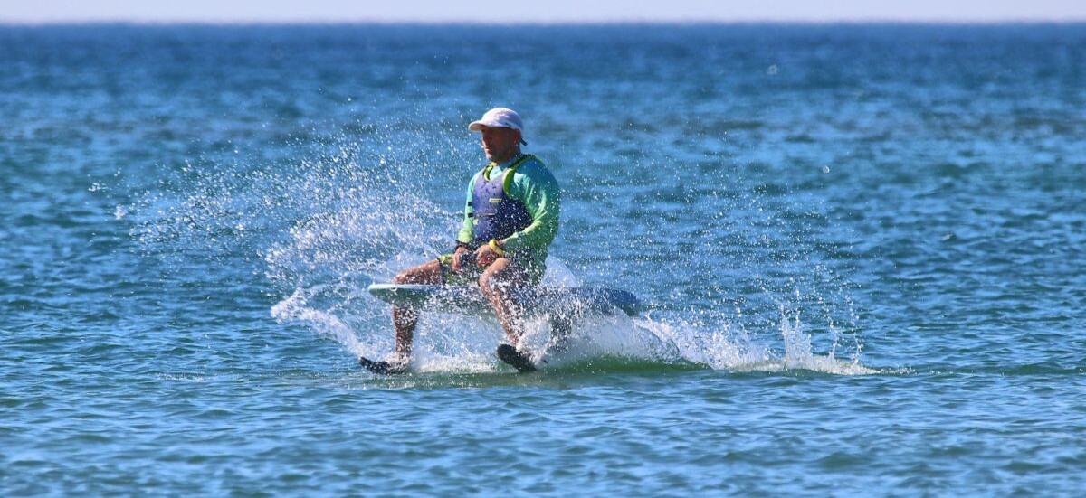 Man sitting on a Waydoo eFoil in Lake Michigan