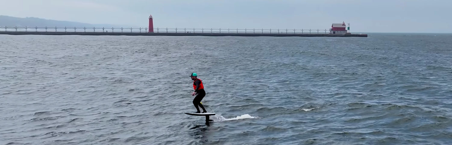 Ryan had a lot of fun out on the lake with the Manta TakeOff Evo. Ryan riding the Manta TakeOff Evo near the Grand Haven pier.