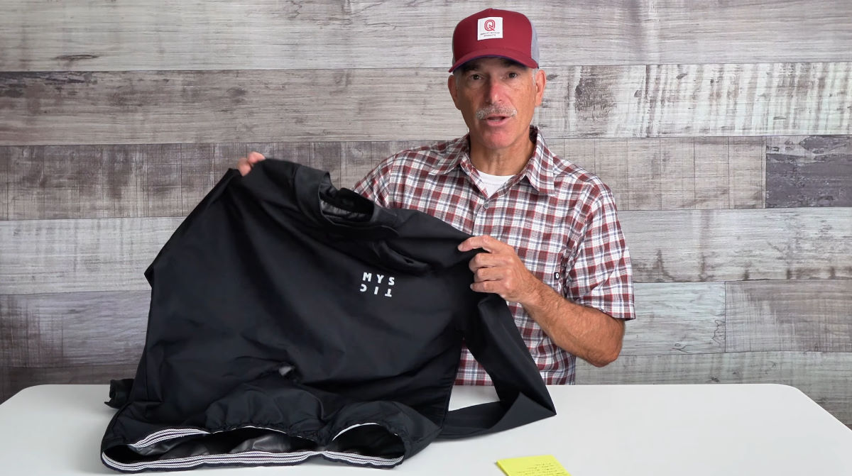 Skip holds up the Mystic Gust windbreaker.