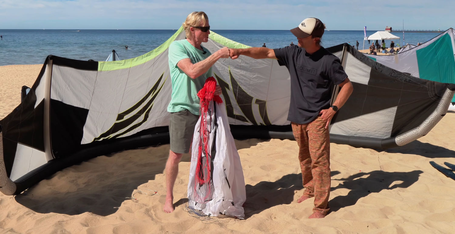 It's always fun to share a chat on the beach. Jeff and Adam share a fist bump.