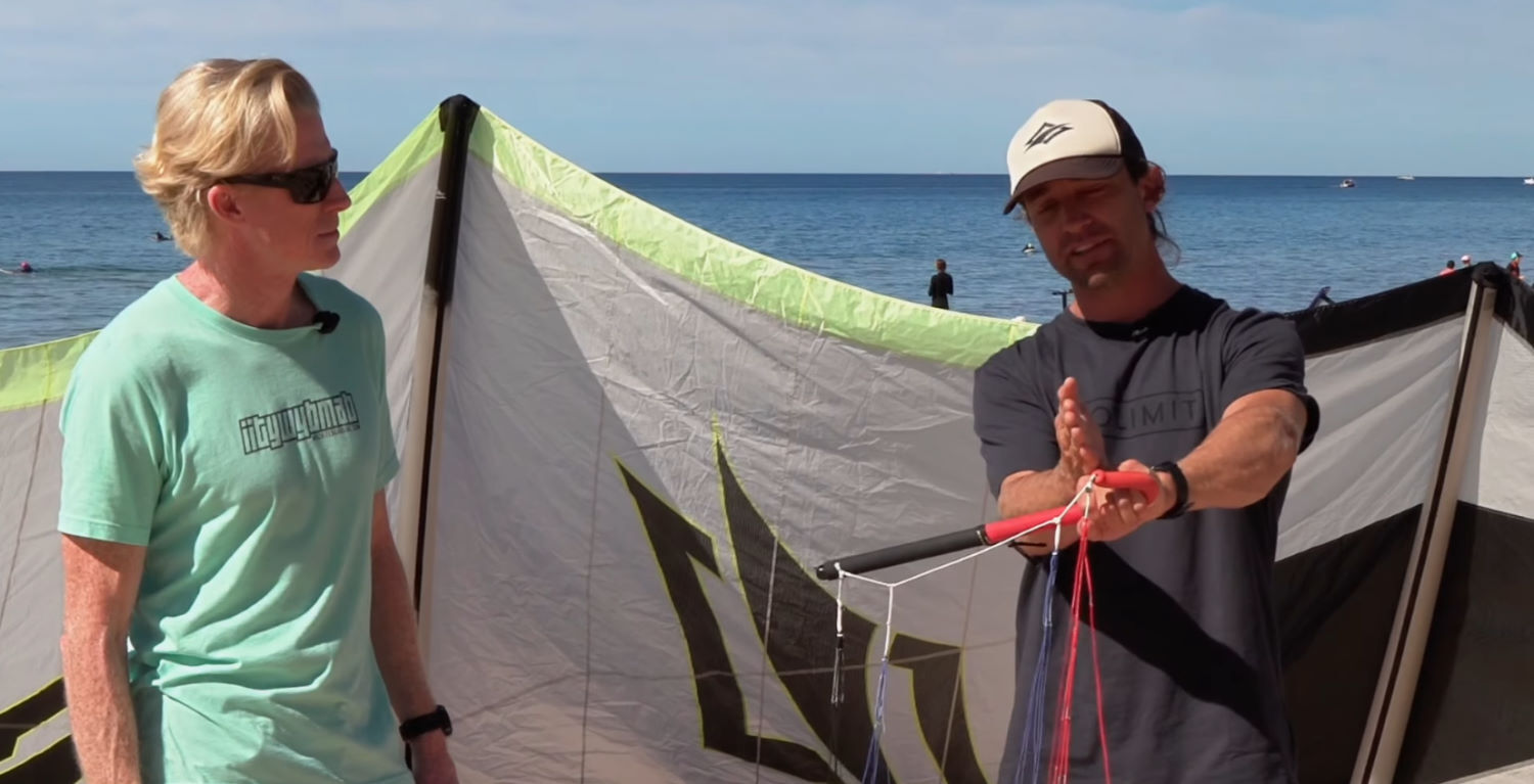 The hook lets you get your hand underneath and even in front of the A lines. Adam shows how to grip the hook bar.