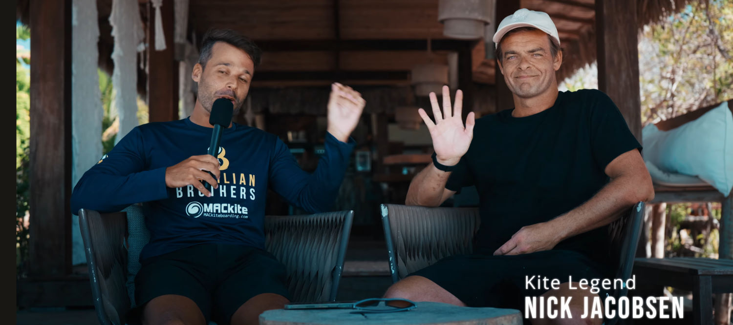 Rubens sat down to chat with Nick Jacobsen, but they didn't stay sitting for long, wanting to get out and enjoy the wind. Rubens interviews Nick Jacobsen at a restaurant in Brazil.