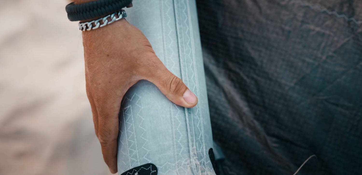 The N-u80 airframe opens up new possibilities for big air on the North Orbit Ultra. Close-up of a hand running along the Orbit Ultra's N-u80 airframe.