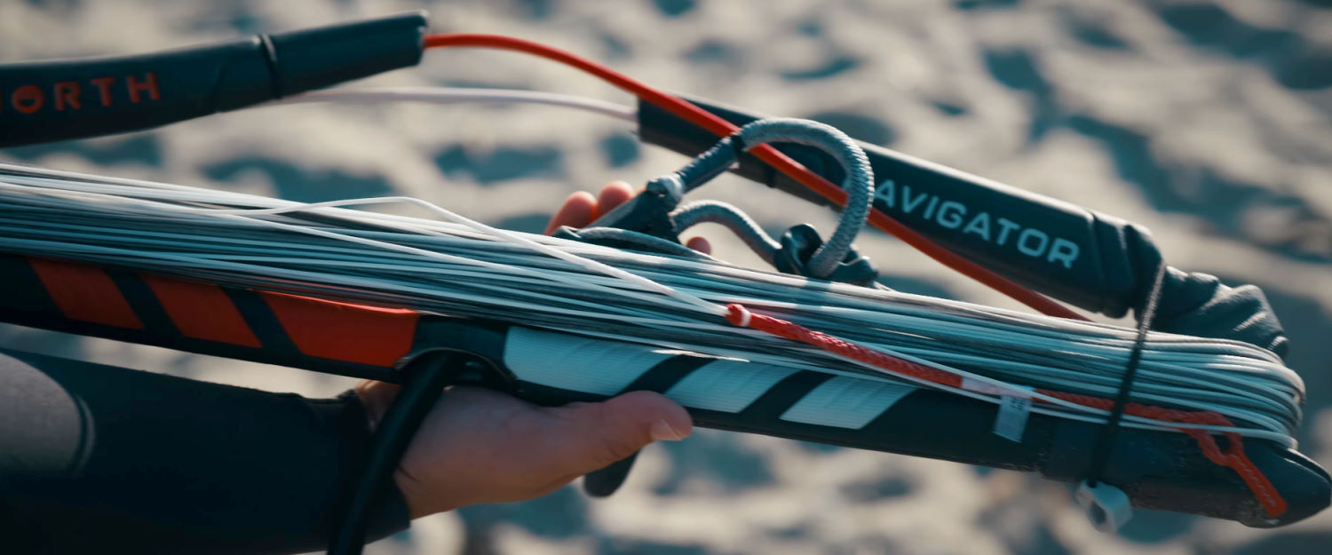The Navigator bar has been redesigned for 2027. Maxwell Dahl holds the 2027 North Navigator control bar in his hand.