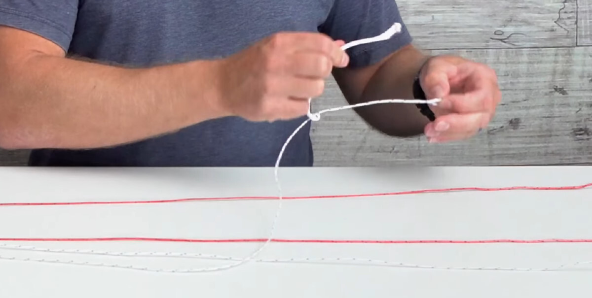 Remove the pigtail so the line will fit through the adapter. removing the pigtail from the end of a kiteboarding line