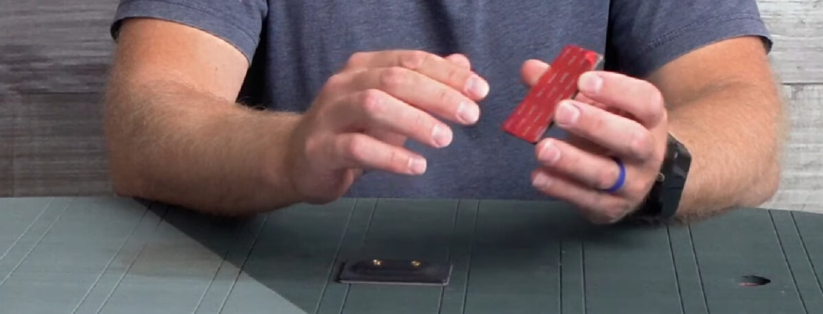 Once your board is prepped, it's as easy as peel n stick! Ryan demonstrates peeling off the backing to reveal the 3M adhesive.