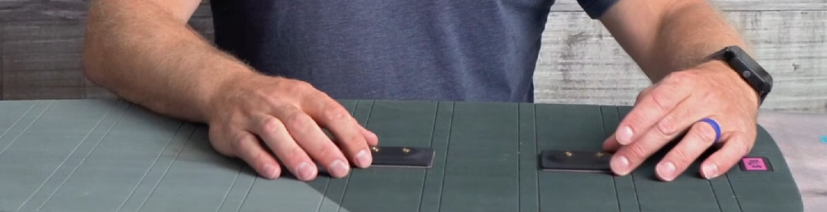 You'll need two inserts per strap and a flat surface. Ryan demonstrates footstrap insert positioning.