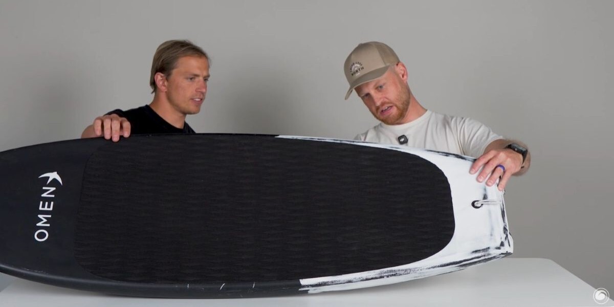 Hunter and Ryan showing the pad coverage and placement on the Omen Capacitor