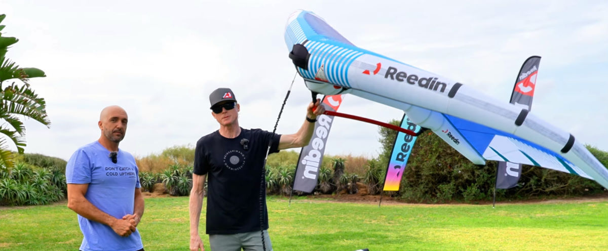 The boom has versatile grip options. Jeff holds the wing up by the front of the boom.
