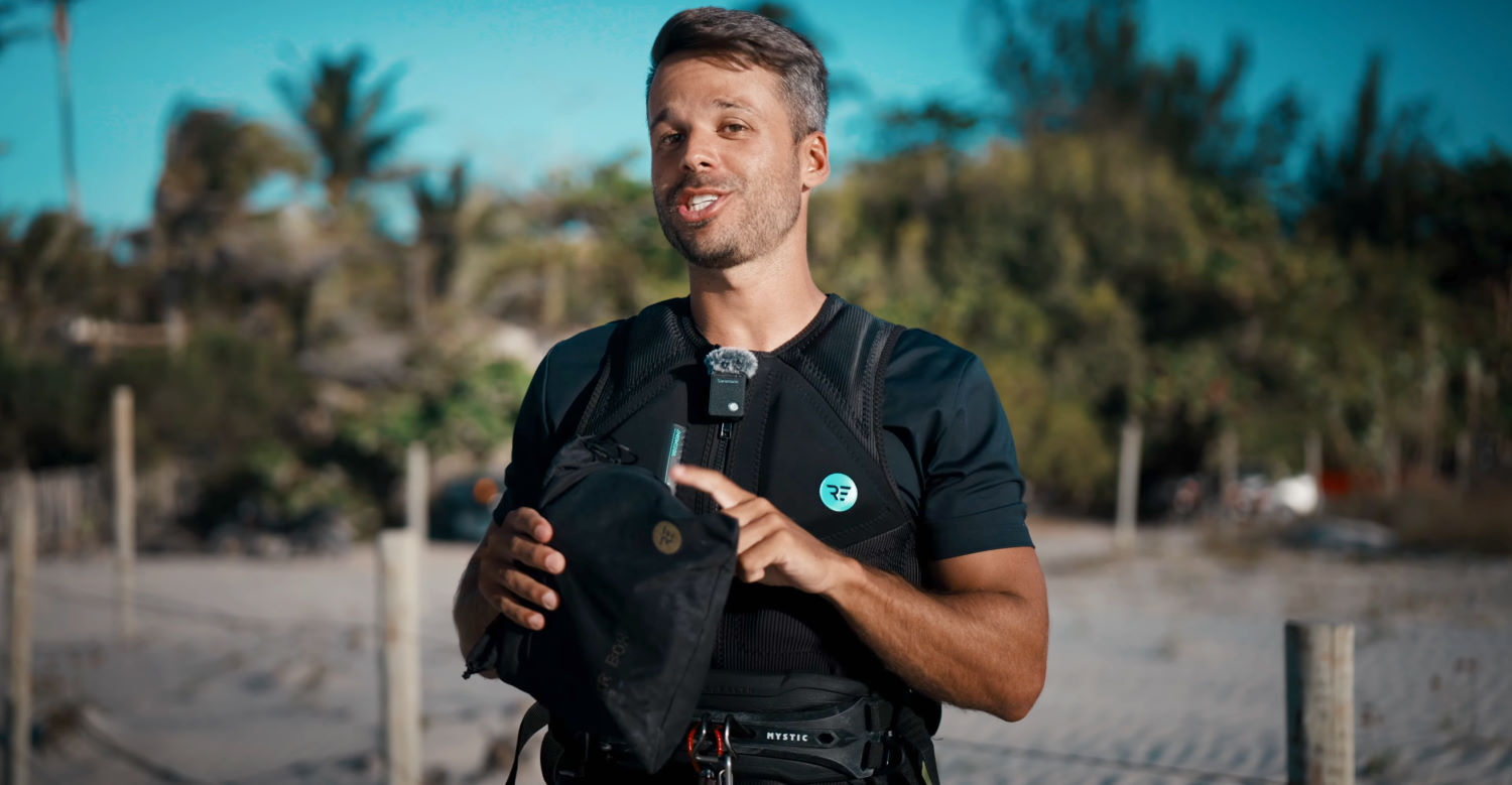 A pouch helps protect your Air Box Mini on and off the beach. Rubens holds the Air Box Mini inside its storage bag.