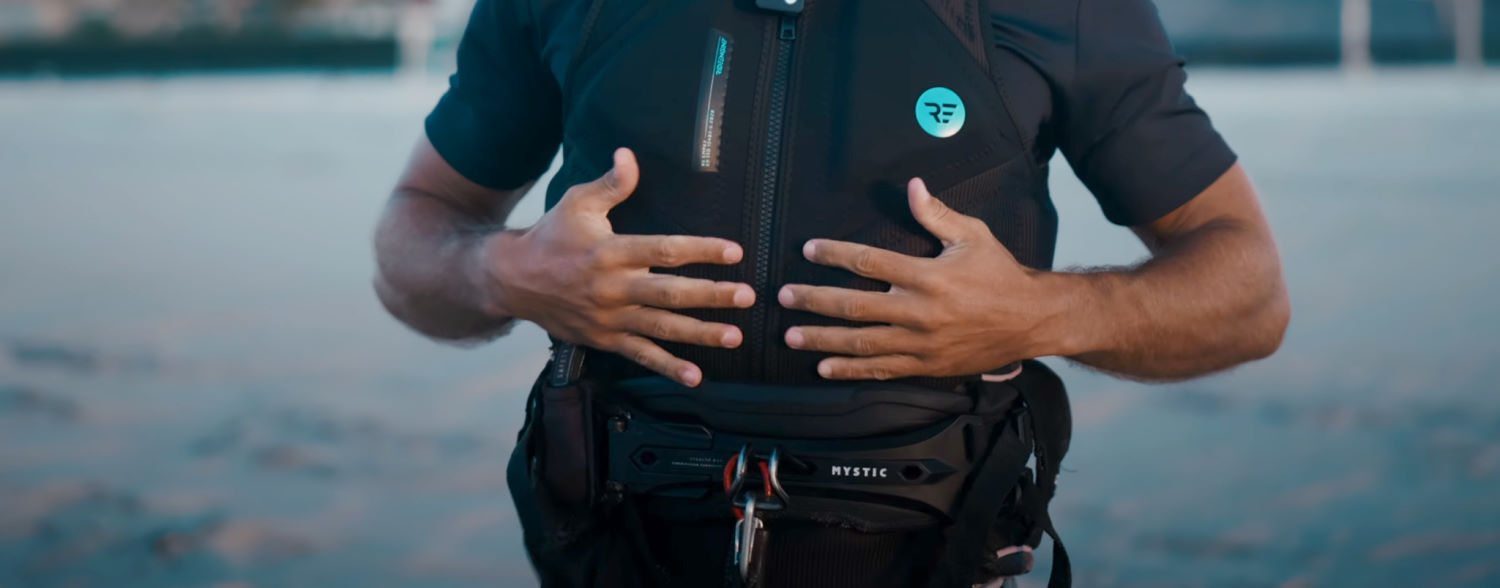 The harness still fits nice and snug thanks to the design of the Empax. Rubens demonstrates fitting the harness over the flat part of the vest.