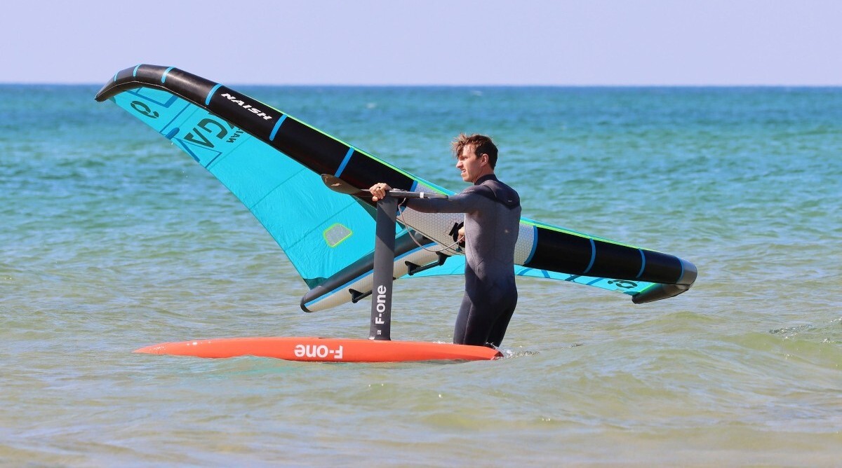 Rider with an F-One Wing Setup