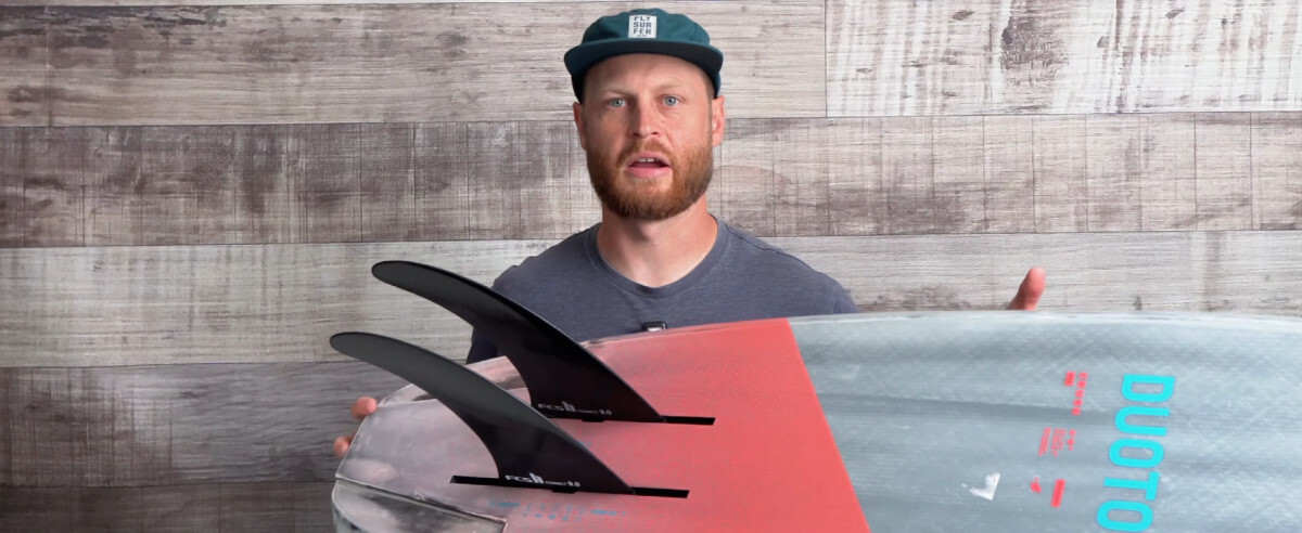 Slingshot's foil track fins mounted into a foilboard.