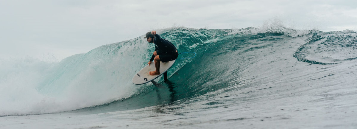 How much maneuverability will you need on the waves you surf? A foil surfer on Code gear banks hard on a wave