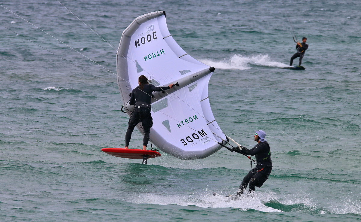 No waves? Get out anyway and practice! Tucker practicing his wing skills on a light wind day